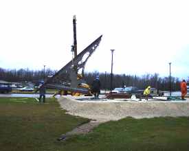 Lifting the gnomon into position.