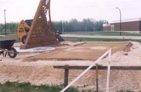 Levelling the dial plate.