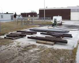 Sandblasting the rails.