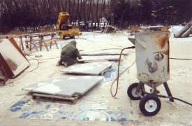 The sandblasting process.